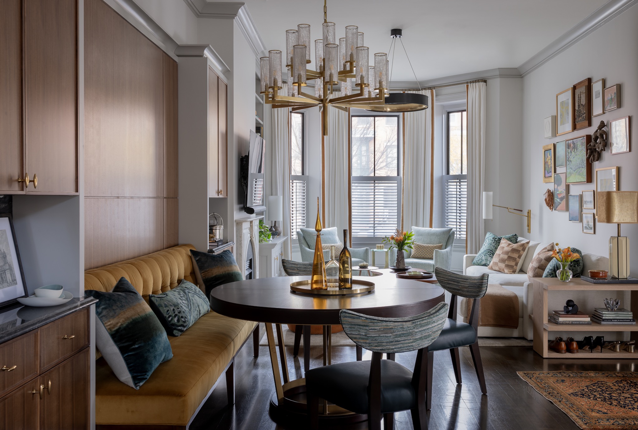 Walnut dining banquette and living room millwork in the Refined Empty Nesters residence